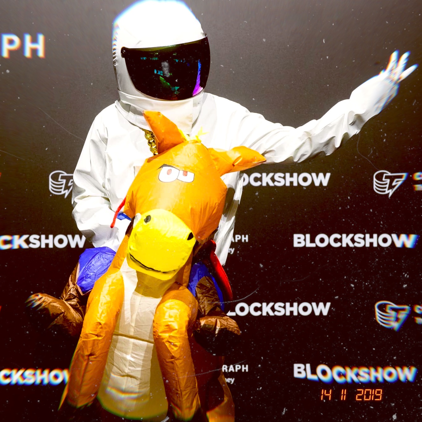 Lil Bubble in spacesuit and horse costume on stage in Singapore